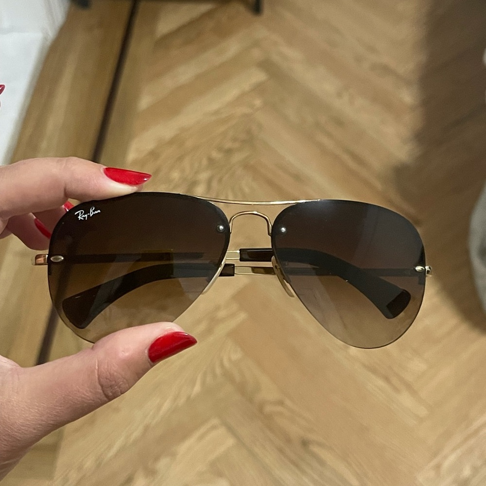 Great condition authentic rimless Rayban aviators.